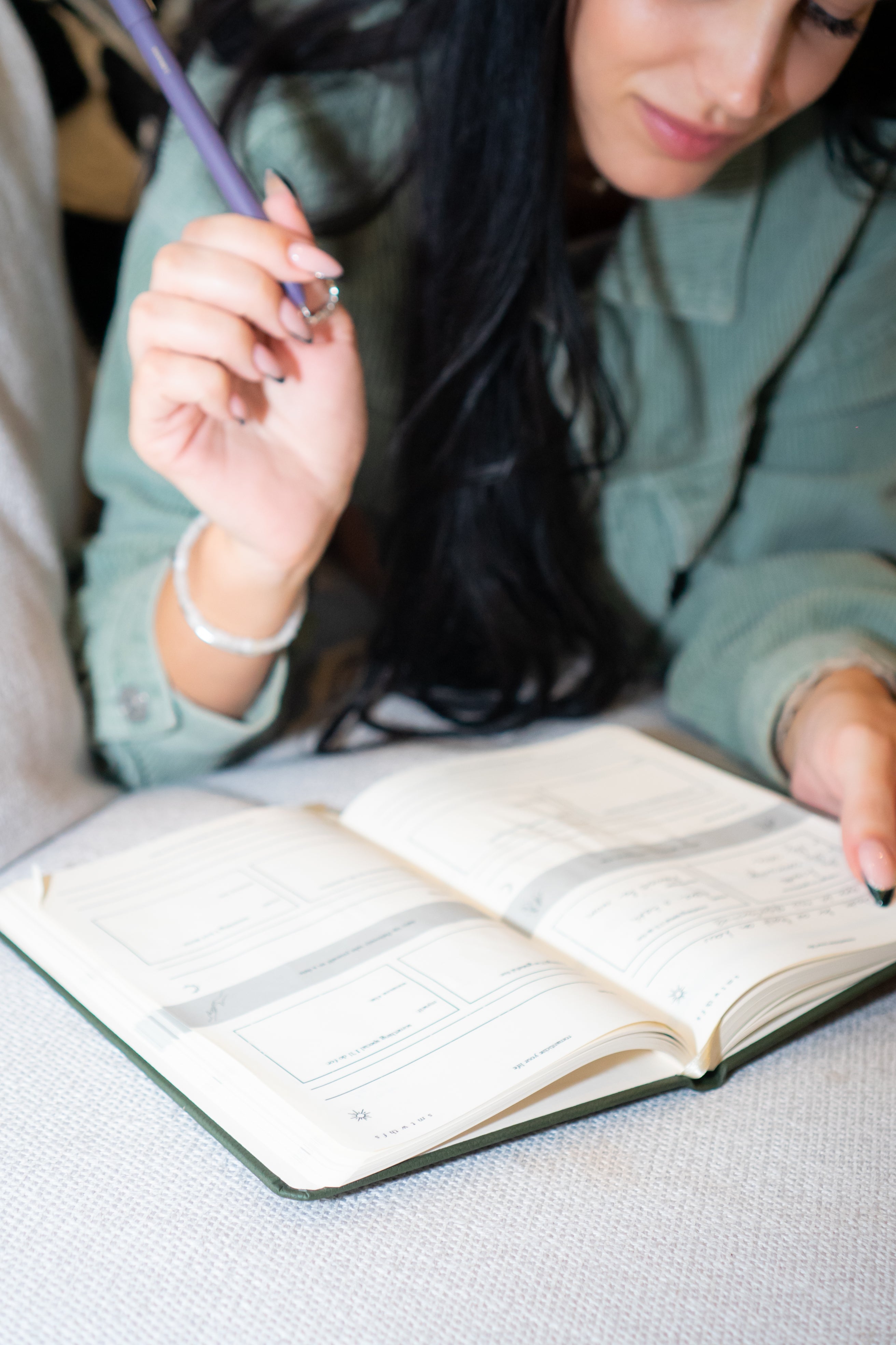 Open page of the Romanticize Your Life Journal featuring inspiring writing prompts.